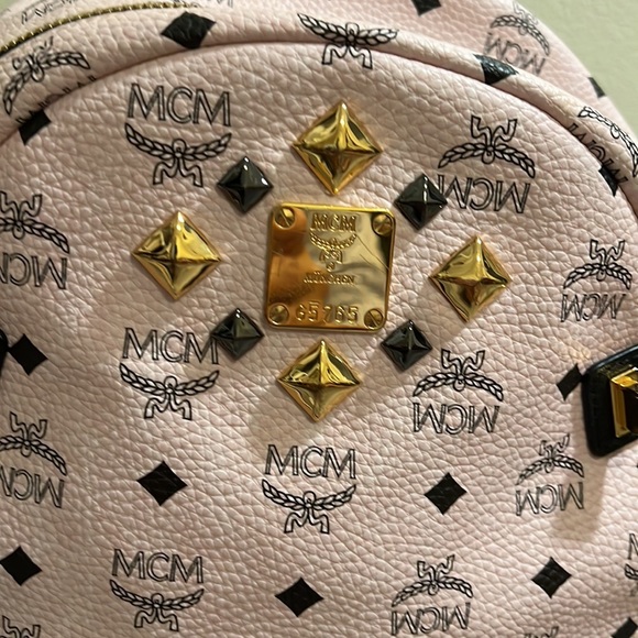 MCM large backpacks with detachable front pockets and use as crossbody bags.. - Picture 3 of 12